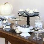 black and white halloween desserts table