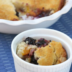 blackberry cobbler in white bowl