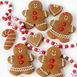 decorated gingerbread cookies with red garland