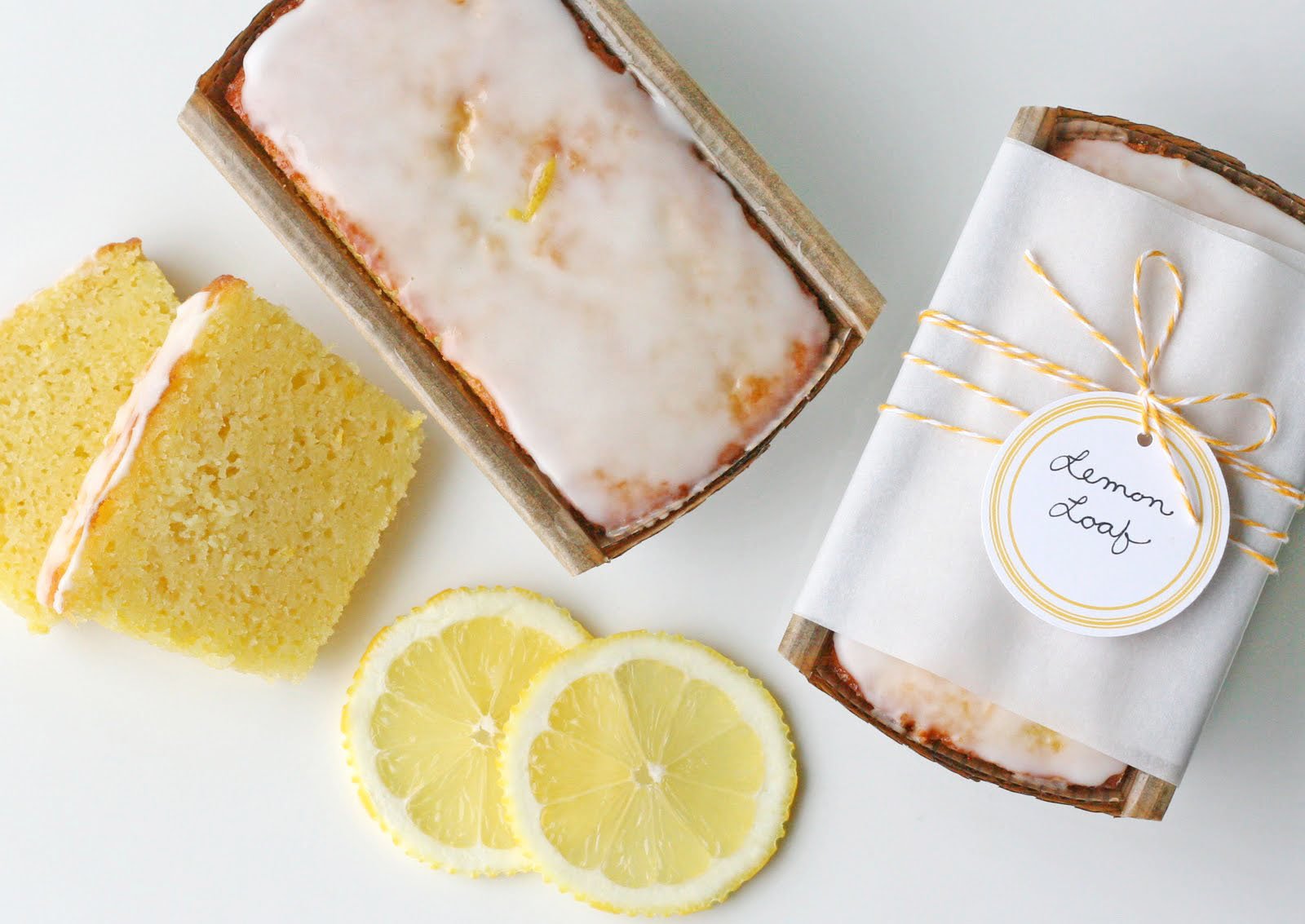 lemon bread recipe with full loaf and slices of lemon bread on white background