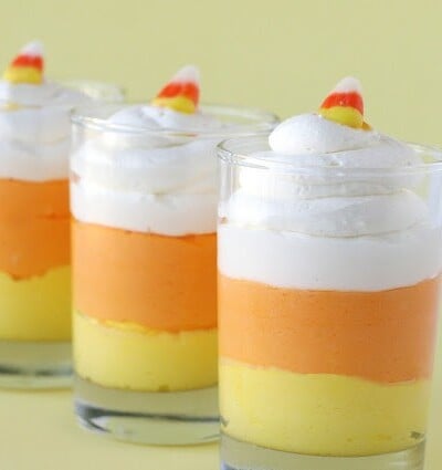 candy corn cheesecake mousse in 3 glasses