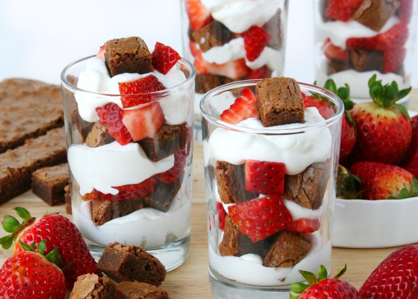 wide look at shortcakes made with brownies in clear glasses.