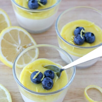 yogurt panna cotta topped with lemon curd and blueblerries