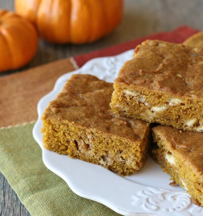 Pumpkin White Chocolate Chip Bars - by glorioustreats.com