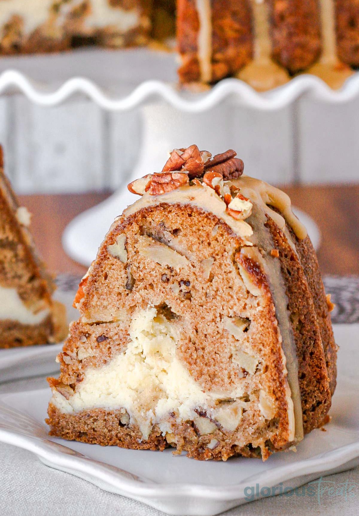 https://www.glorioustreats.com/wp-content/uploads/2013/09/apple-cream-cheese-bundt-cake-hero.jpeg