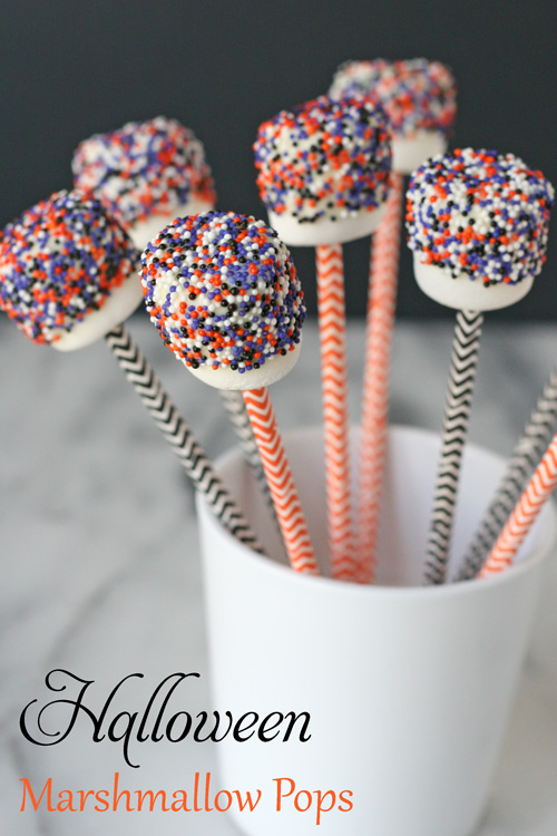 So simple and so cute!!  Halloween Marshmallow Pops - glorioustreats.com