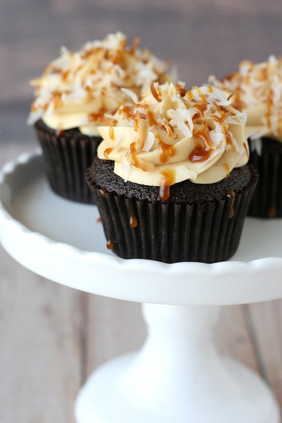 So INCREDIBLY good!! Chocolate cupcakes topped with caramel buttercream and toasted coconut... inspired by Samoa Cookies. 