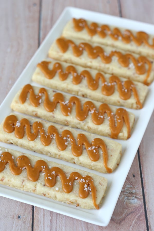 You won't believe how good these cookies are until you try one! Sweet, salty, crispy, chewy, these amazing Salted Butterscotch Cookies will blow your mind! 