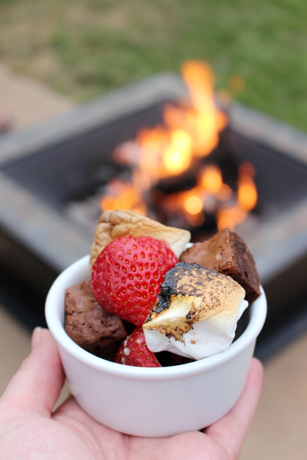 Create the best s'mores treat ever with rich brownie bites, fresh strawberries and roasted marshmallows... YUM! 
