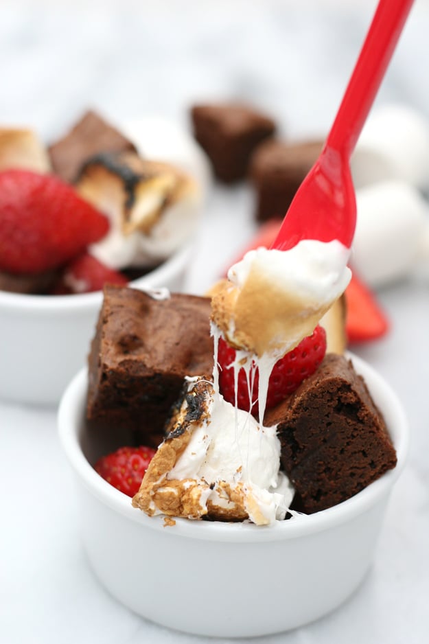Brownie Strawberry S'mores | Rich fudge brownie, fresh strawberries and toasted marshmallows... YUM! 