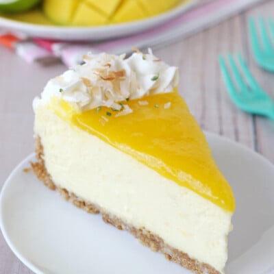 This Mango Lime Cheesecake is rich, creamy and bursting with tropical flavors!