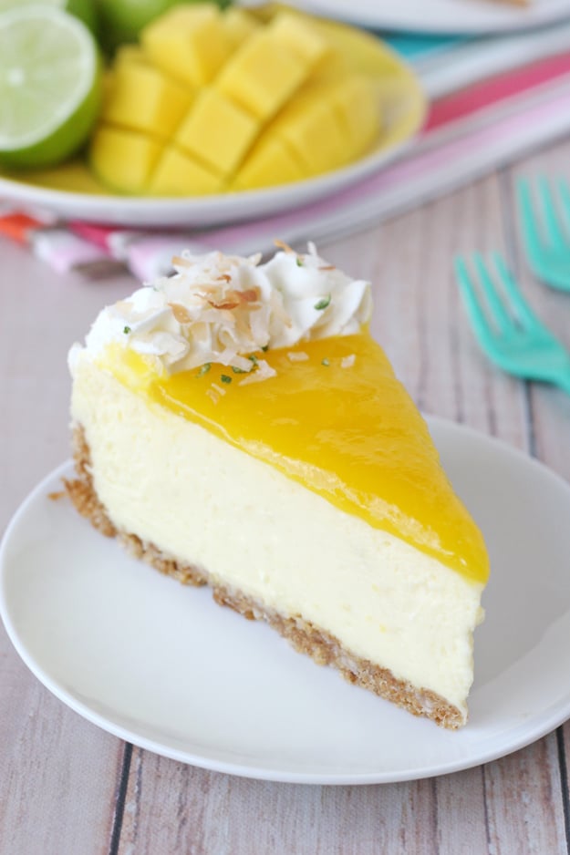 This Mango Lime Cheesecake is rich, creamy and bursting with tropical flavors! 