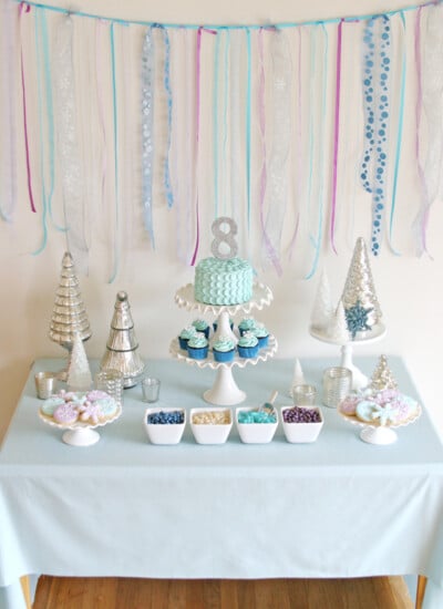 Gorgeous Frozen themed dessert table! Ideas and recipes perfect for any winter party!