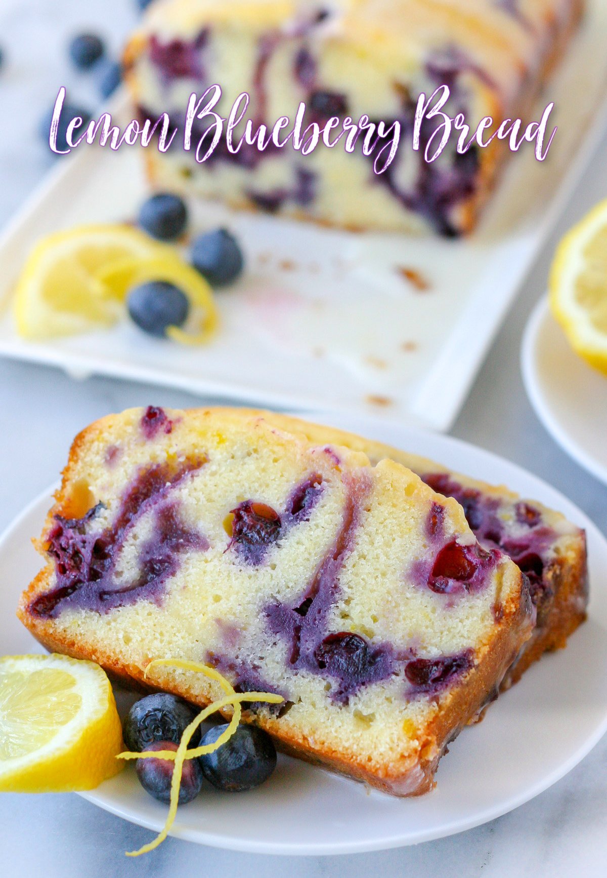 twos slices of lemon blueberry bread on white plate with title overlay