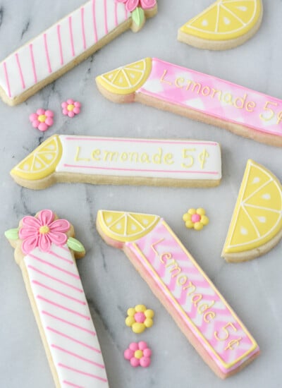 These adorable Lemonade Cookie Sticks are perfect for a lemonade stand or lemon themed party!