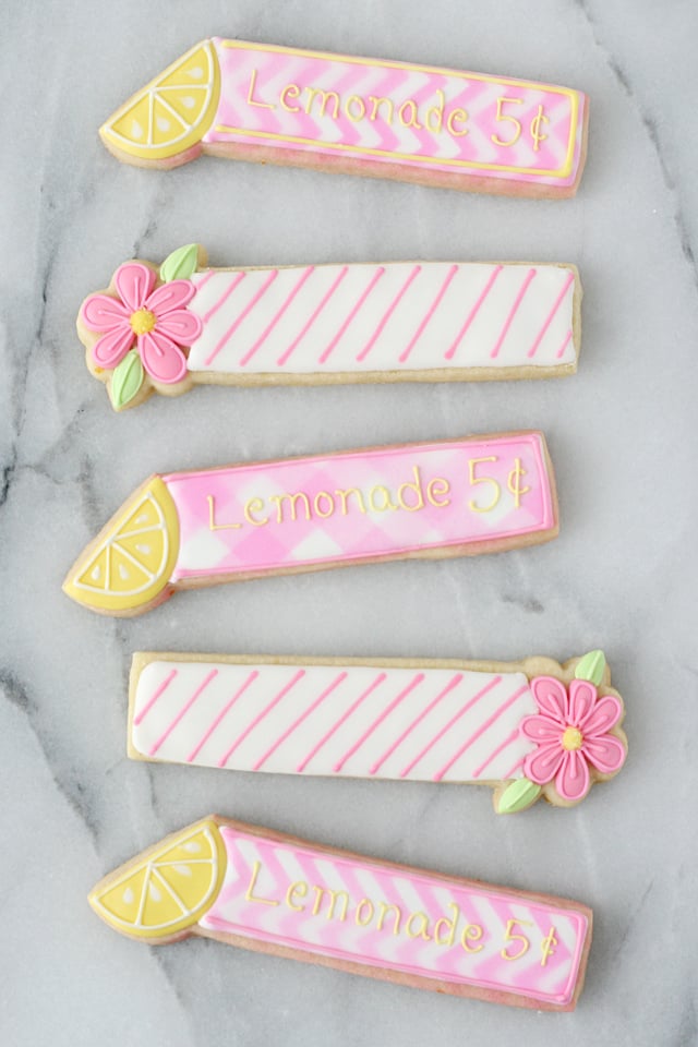 These adorable Lemonade Cookie Sticks are perfect for a lemonade stand or lemon themed party!
