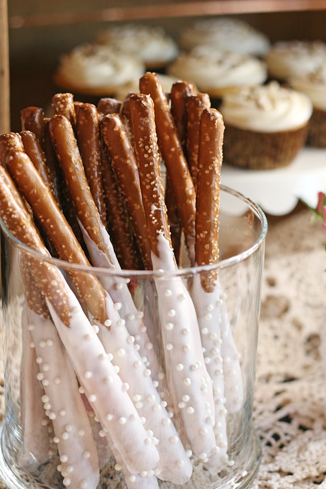 Such a simple and beautiful treat! Chocolate dipped pretzel rods! 