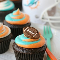 Impressive tri-color frosting for custom football fan cupcakes!