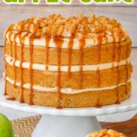 Tall graphic showing whole caramel apple cake made with caramel frosting and spiced apples. A slice of the cake is also shown. Text overlay at top and bottom of image.