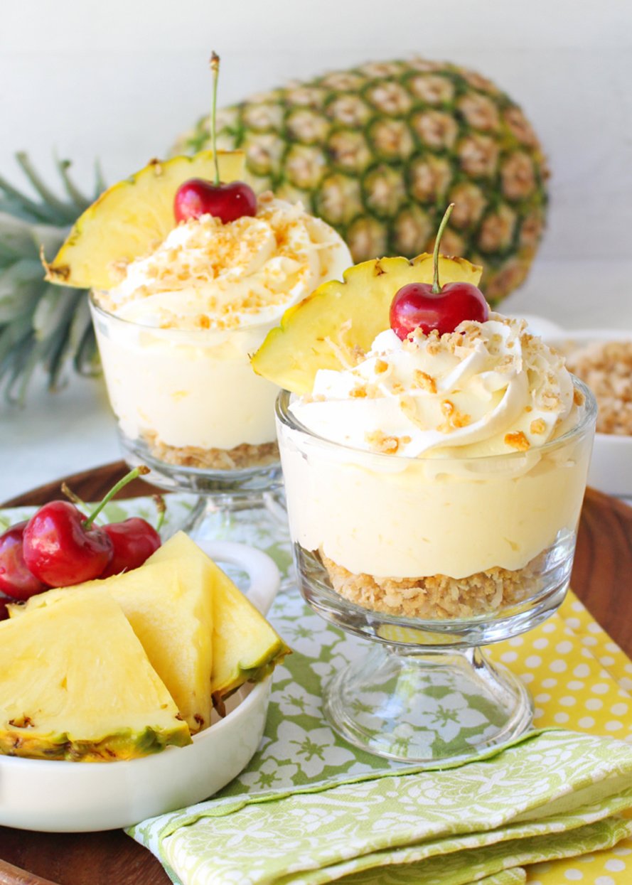 pina colada mousse with cherry garnish