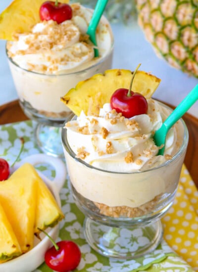 pina colada mousse with pineapple wedge garnish square