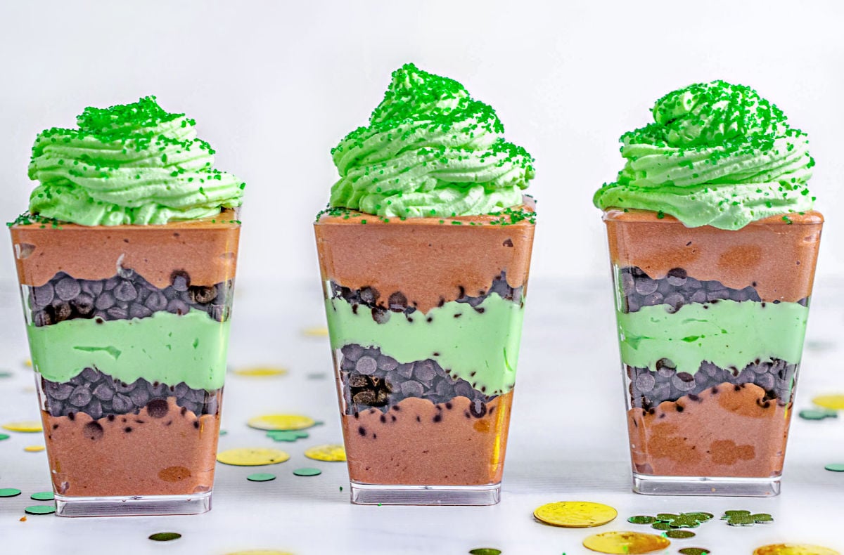 three chocolate mint layered desserts lined up