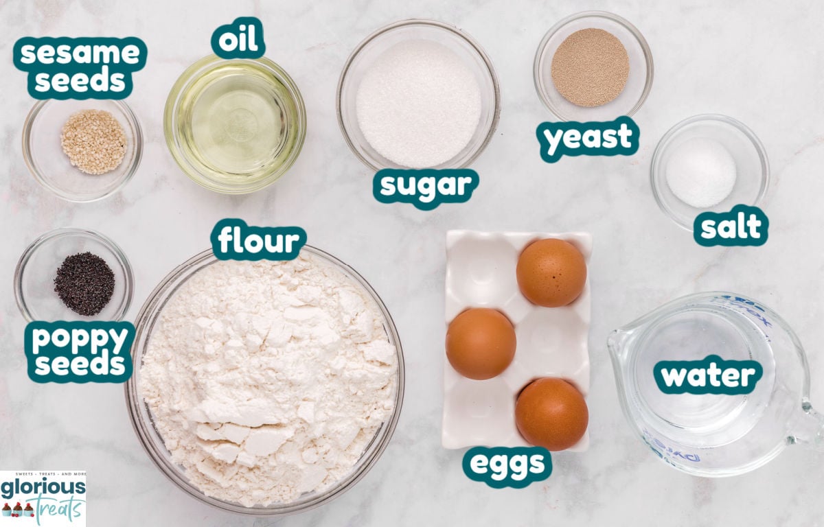Overhead shot of challah rolls ingredients measure out into small bowls with text labels.