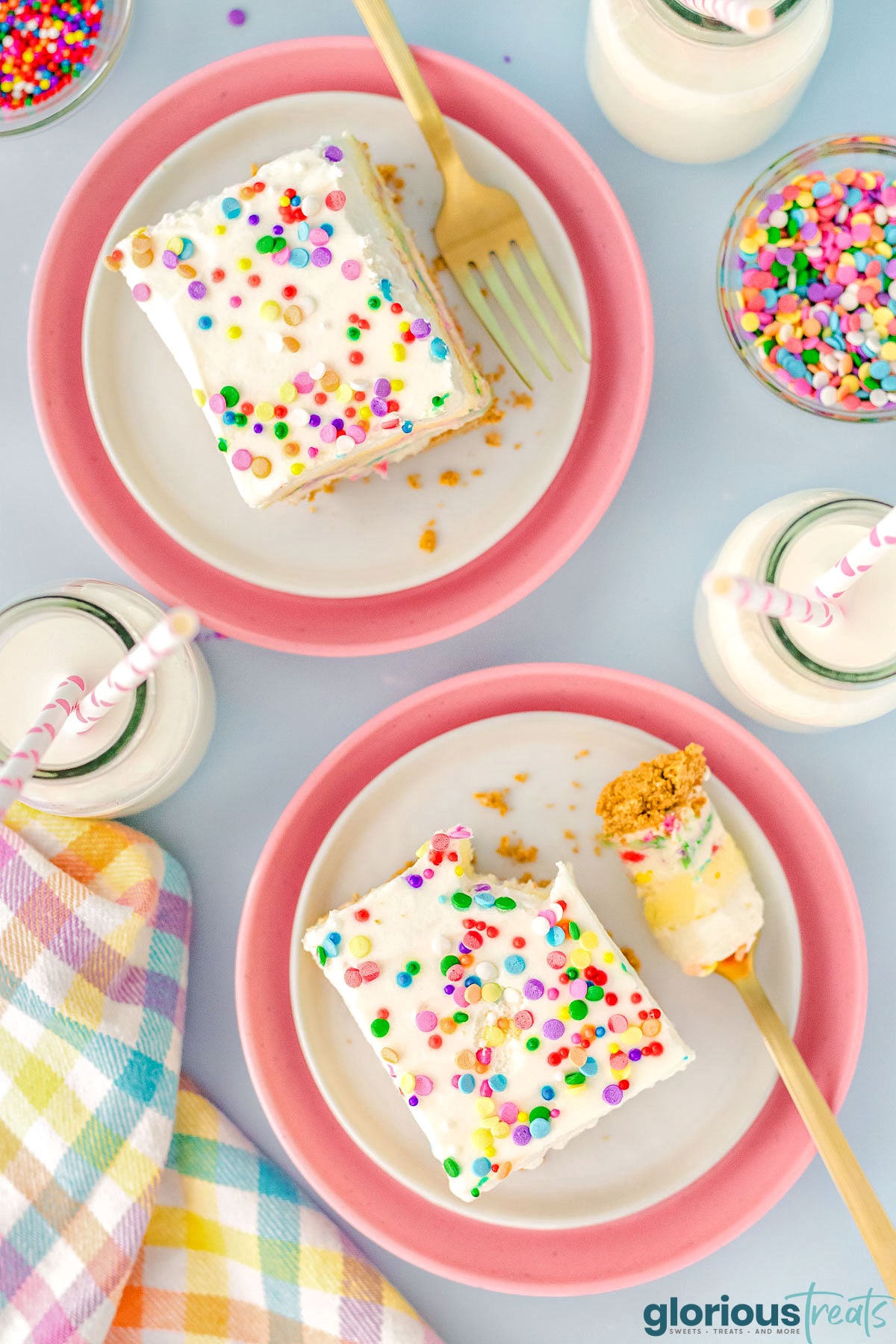 Overhead shot of two plates with pieces of funfetti lush on them.